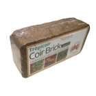 ryset-tropicoir-coir-block-qualitygardensupplies-02 - Quality Garden Supplies Compressed coir brick (coconut fiber) with a Tropicoir Coir Brick Classic label, used as potting mix/amendment - Quality Garden Supplies